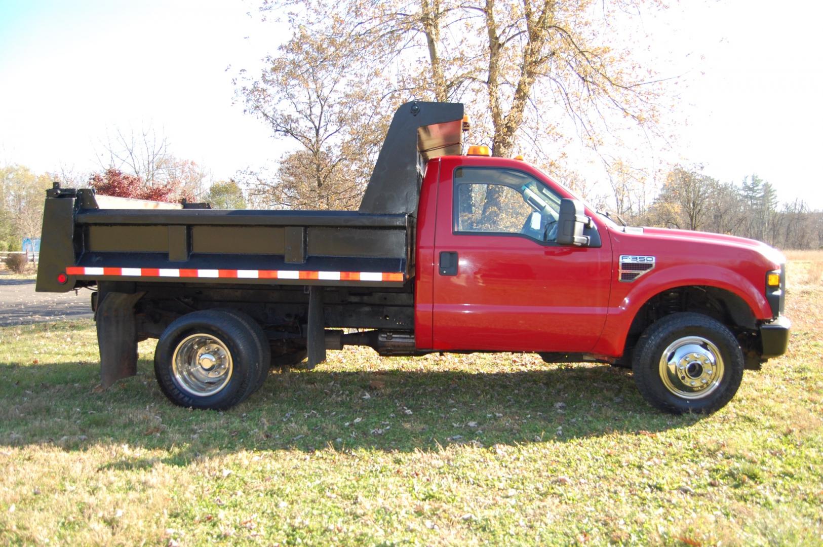 2008 RED /Grey Vinyl Ford F-350 SD XL DRW 4WD (1FDWF37R68E) with an 6.4L V8 OHV 32V TURBO DIESEL engine, Manual transmission, located at 6528 Lower York Road, New Hope, PA, 18938, (215) 862-9555, 40.358707, -74.977882 - This vehicle has a reconstructed title. Here we have a 2008 Ford F350 dump body with a 6.4L V8 Diesel engine putting power to the ground via a manual shifting 4X4 transmission. The interior offers grey leather, AC/HEAT, AM/FM radio, roll up windows and front airbags for safety. The exterior offers r - Photo#5